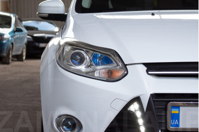 FORD FOCUS встановлення біксенонових лінз Hella F1