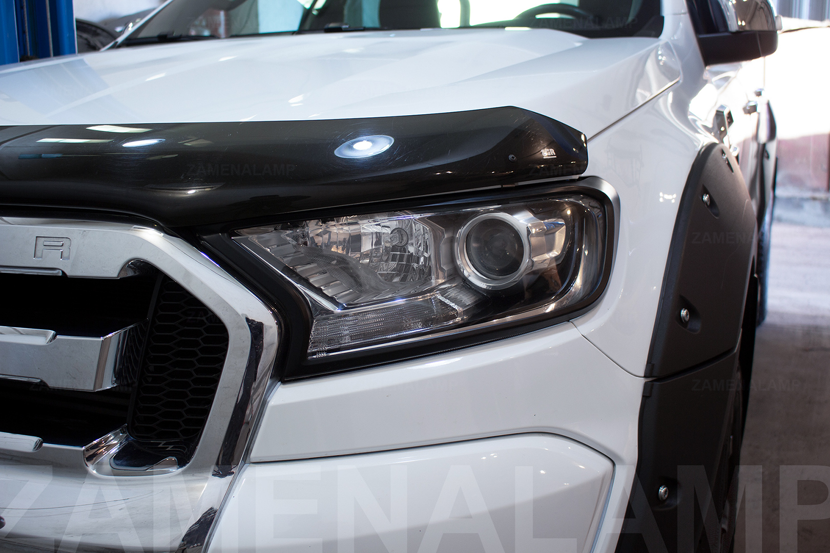 Заміна лінз в фарах FORD RANGER на біксенонові лінзи Hella 5