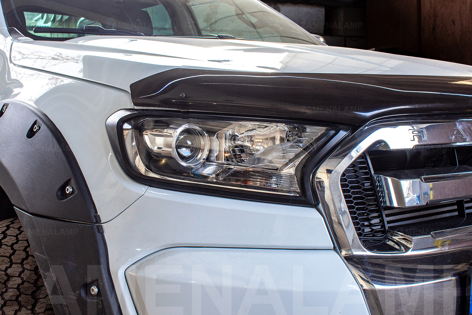 Заміна лінз в фарах FORD RANGER на біксенонові лінзи Hella 5