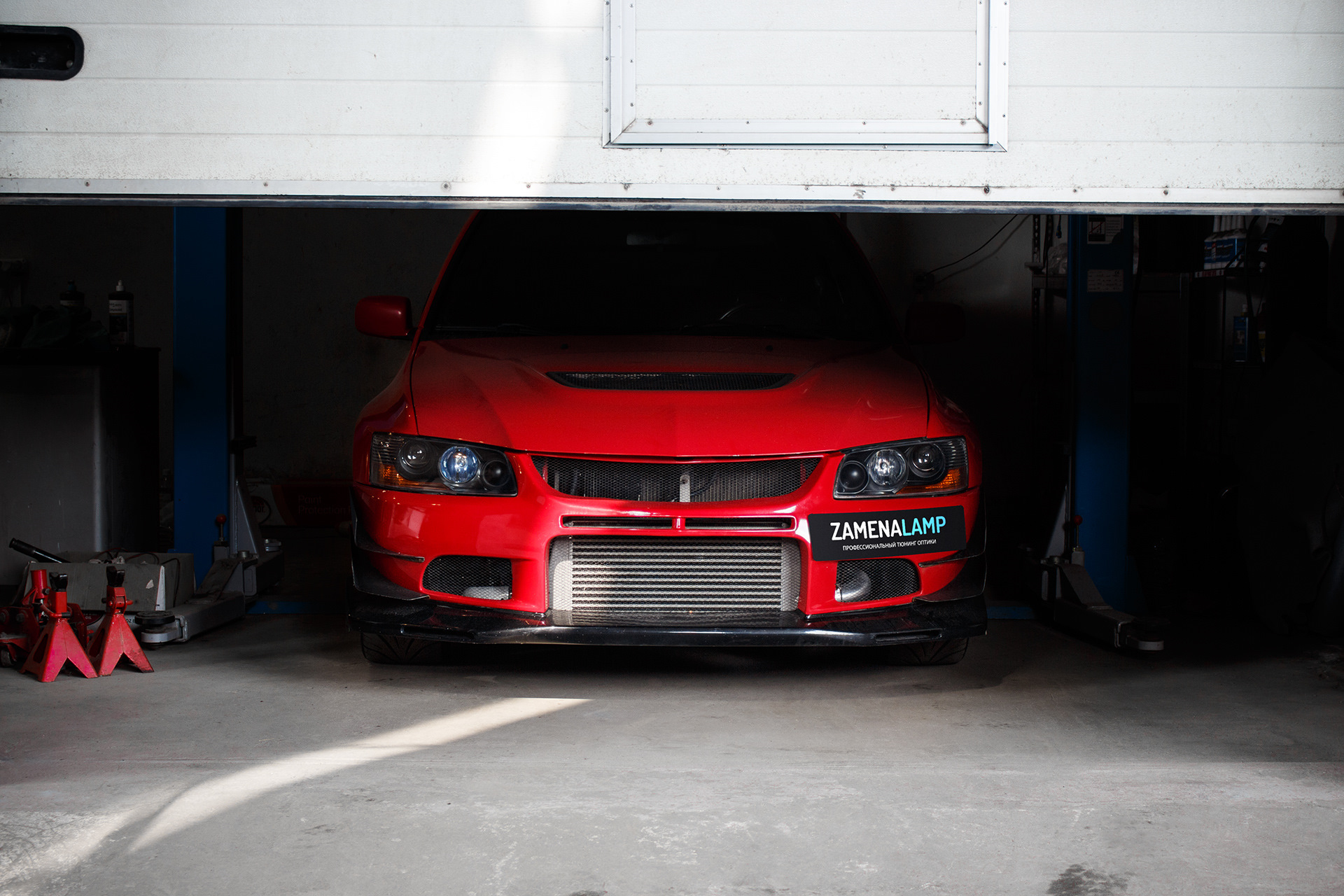 Заміна штатних лінз у фарах Mitsubishi Lancer EVO IX на біксенонові лінзи Koito Q5