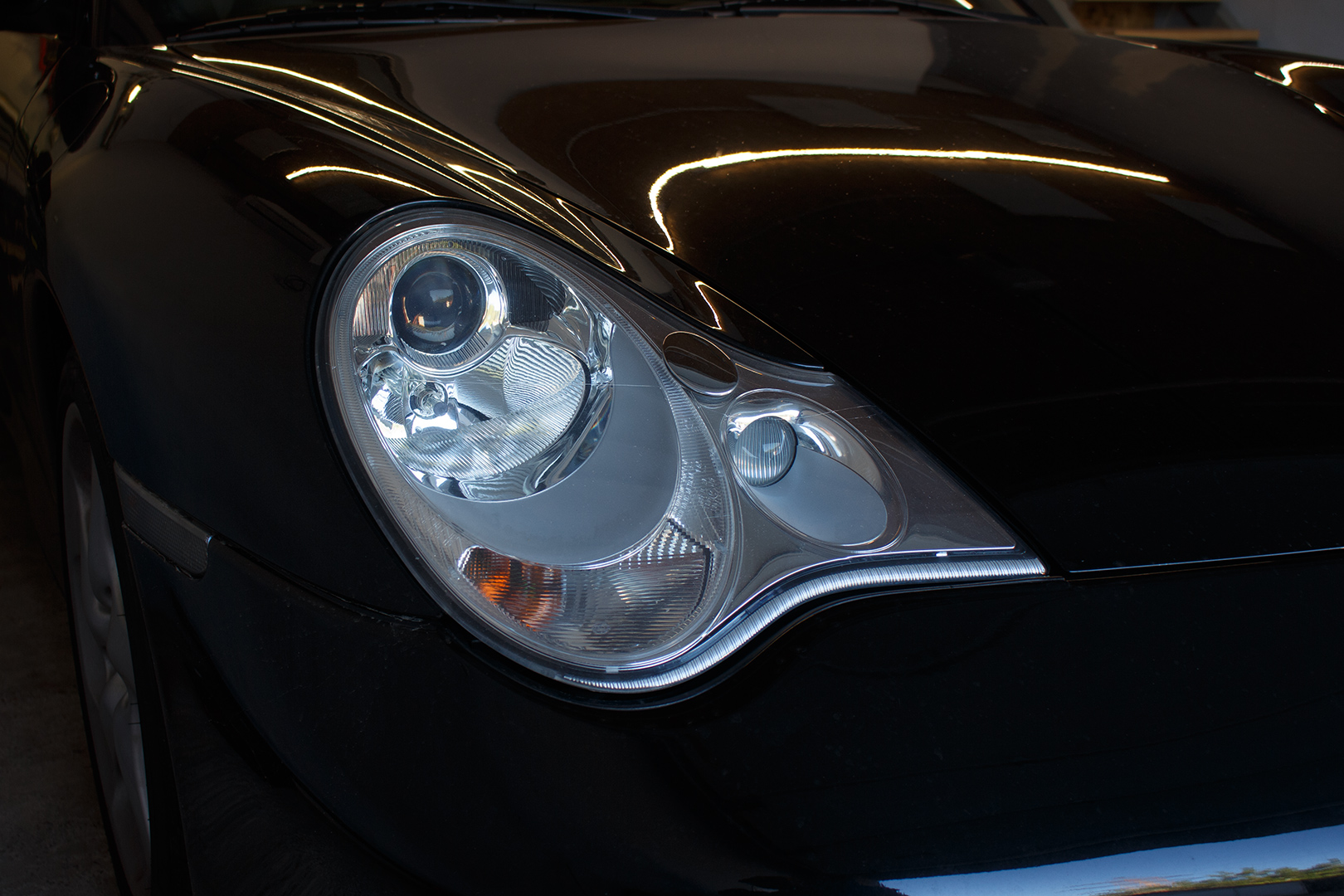 PORSCHE 911 - заміна штатних лінз на біксенонові лінзи Hella 3R