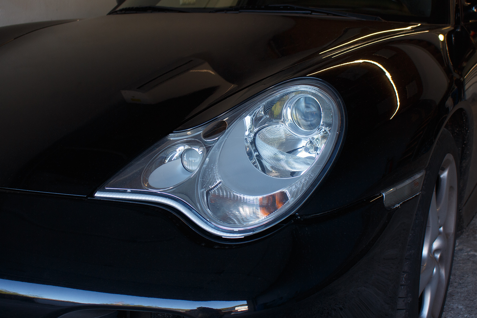 PORSCHE 911 - заміна штатних лінз на біксенонові лінзи Hella 3R