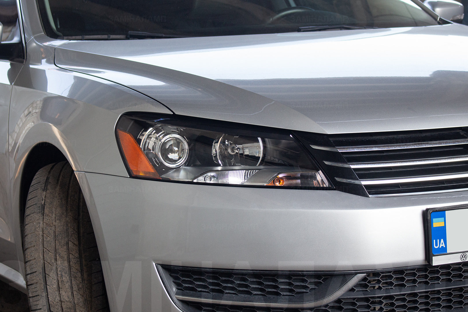 Зовнішній вигляд правої фари Volkswagen Passat B7 ПІСЛЯ встановлення біксенонових лінз Hella F1